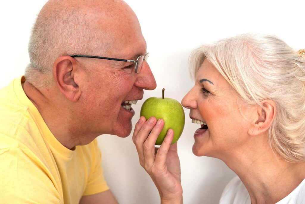 Taste the Difference: Dentures vs. Implants and Your Eating Experience